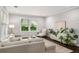 Bright living room with neutral decor, large windows, and comfortable seating at 1450 Oglethorpe Sw Ave, Atlanta, GA 30310