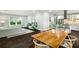 Open concept living space featuring hardwood floors, modern furnishings, and adjoined to the bright kitchen at 1450 Oglethorpe Sw Ave, Atlanta, GA 30310