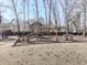 Spacious backyard featuring a playset, providing a fun and safe environment for children to play at 2311 October Nw Ct, Acworth, GA 30102