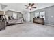 Bright bedroom with vaulted ceiling, neutral carpet and a ceiling fan at 2311 October Nw Ct, Acworth, GA 30102