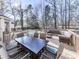 Expansive wooden deck offering ample seating, dining space, and views of the backyard pool, perfect for entertaining at 2311 October Nw Ct, Acworth, GA 30102