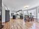 This kitchen features a breakfast nook, kitchen island, stainless steel appliances, and light colored cabinets at 2311 October Nw Ct, Acworth, GA 30102