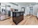 Kitchen with stainless steel appliances, center island and hardwood floors at 2311 October Nw Ct, Acworth, GA 30102