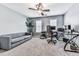 Home office with a large window for natural light, comfortable furniture, and soft carpet at 2311 October Nw Ct, Acworth, GA 30102