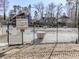 Community pool area enclosed by a secure fence, ensuring a safe and enjoyable swimming experience for residents at 2311 October Nw Ct, Acworth, GA 30102