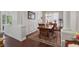 Elegant dining room with hardwood floors and a large wooden table at 5035 Castlegate Ct, Cumming, GA 30040