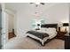 Spacious bedroom with a vaulted ceiling and two windows for natural light at 1519 Dolcetto Nw Trce # 1, Kennesaw, GA 30152