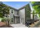 Rear exterior with a patio, grill, neutral siding, and partial shade trees at 1519 Dolcetto Nw Trce # 1, Kennesaw, GA 30152
