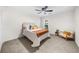 Neutral bedroom featuring carpet, ceiling fan and comfortable seating area at 2693 Greentree Se Dr, Marietta, GA 30067