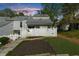 Charming townhome with a picket fence, well-maintained landscaping, and inviting curb appeal nestled in a serene neighborhood at 2693 Greentree Se Dr, Marietta, GA 30067