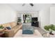 Comfortable living room offering natural light, a ceiling fan, and neutral decor at 2693 Greentree Se Dr, Marietta, GA 30067