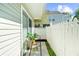Private outdoor patio with a white picket fence, offers a cozy spot to relax and enjoy fresh air at 2693 Greentree Se Dr, Marietta, GA 30067