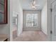 Versatile bonus room featuring a ceiling fan, and a bright window enhancing the room's openness and functionality at 2732 Pierce Brennen Ct, Lawrenceville, GA 30043