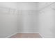 Empty walk-in closet offering wire shelving and neutral carpet at 2732 Pierce Brennen Ct, Lawrenceville, GA 30043