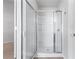 Bright shower stall with glass door and white tiled walls, offering a clean aesthetic at 2732 Pierce Brennen Ct, Lawrenceville, GA 30043