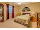 Bedroom with window, ceiling fan, and decorative Asian inspired fan at 293 Country Lake Dr, Mcdonough, GA 30252