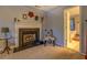 Bedroom features a fireplace with a decorative mantle at 293 Country Lake Dr, Mcdonough, GA 30252