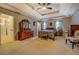 Spacious main bedroom with neutral colors, sitting area, and ensuite at 293 Country Lake Dr, Mcdonough, GA 30252