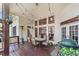 Back porch features a dining set and outdoor kitchen, perfect for entertaining at 3137 Perimeter Cir, Buford, GA 30519