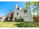 Beautiful backyard of a home with siding, a deck, and a fenced in yard at 3137 Perimeter Cir, Buford, GA 30519
