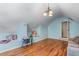 Bonus room with hardwood floors, window nook, and neutral walls, perfect for a play room or office at 3137 Perimeter Cir, Buford, GA 30519