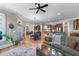 Dining area open to kitchen and living room with hardwood flooring at 3137 Perimeter Cir, Buford, GA 30519