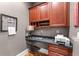 Compact home office with built-in desk and storage at 3137 Perimeter Cir, Buford, GA 30519