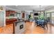 Open kitchen with stainless appliances, granite countertops and access to living and dining areas at 3137 Perimeter Cir, Buford, GA 30519