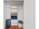 Closet includes wire shelving for optimal storage with wood floor at 6940 Roswell Rd # 24E, Sandy Springs, GA 30328
