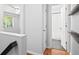Hallway with view into bathroom and bedroom at 6940 Roswell Rd # 24E, Sandy Springs, GA 30328