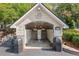 Community mail kiosk with mailboxes and bicycle parking at 6940 Roswell Rd # 24E, Sandy Springs, GA 30328