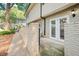 View of the patio area with an installed privacy fence at 6940 Roswell Rd # 24E, Sandy Springs, GA 30328