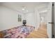 Bedroom featuring a colorful rug, hardwood floors and a window at 2433 Helmsdale Ne Dr, Atlanta, GA 30345