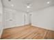 Bright bedroom featuring hardwood floors, a ceiling fan, recessed lighting, and a closet at 2433 Helmsdale Ne Dr, Atlanta, GA 30345