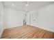 Bright bedroom featuring hardwood floors, a ceiling fan and a closet at 2433 Helmsdale Ne Dr, Atlanta, GA 30345