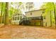 Charming two-story home with a spacious deck and sunroom, perfect for outdoor entertaining at 2433 Helmsdale Ne Dr, Atlanta, GA 30345