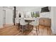 Eat-in kitchen with island, granite counters, stainless appliances, and modern cabinetry at 2433 Helmsdale Ne Dr, Atlanta, GA 30345