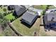 The house features a deck and ample yard space bordered by lush green trees creating a secluded and peaceful atmosphere at 5320 Northview Lk, Cumming, GA 30040