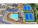 Community aerial view showcasing a pool, playground, tennis courts, and parking at 5320 Northview Lk, Cumming, GA 30040