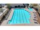 Aerial view of a community pool featuring clear blue water, lounge chairs and a slide at 5320 Northview Lk, Cumming, GA 30040