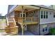 The deck features lighting and ample space for outdoor dining or relaxing, seamlessly blending indoor and outdoor living at 5320 Northview Lk, Cumming, GA 30040