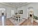 Inviting dining room showcasing hardwood floors and an open entrance way at 5320 Northview Lk, Cumming, GA 30040