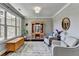 Bright living room showcasing natural light, hardwood floors, and comfortable seating area at 5320 Northview Lk, Cumming, GA 30040