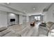 Bright living area with modern flooring, recessed lighting, and ample space for entertaining and relaxation at 5320 Northview Lk, Cumming, GA 30040