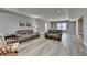 Open-concept living space with gray walls, recessed lighting, and comfortable seating, creating a welcoming atmosphere at 5320 Northview Lk, Cumming, GA 30040