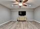 Cozy living area with recessed lighting, ceiling fan, and a flat-screen TV, perfect for relaxing and entertainment at 5320 Northview Lk, Cumming, GA 30040