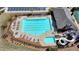 Aerial view of the community pool with lanes, a slide, and ample seating at 5320 Northview Lk, Cumming, GA 30040