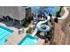 Community pool with large slide, tables, and chairs available for residents at 5320 Northview Lk, Cumming, GA 30040