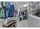 Spacious walk-in closet with ample storage, shelving, and shoe racks at 5320 Northview Lk, Cumming, GA 30040