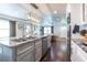 Bright kitchen with island sink, stainless appliances, and open-concept design leading to the living area at 1010 Eden Se Ave, Atlanta, GA 30316